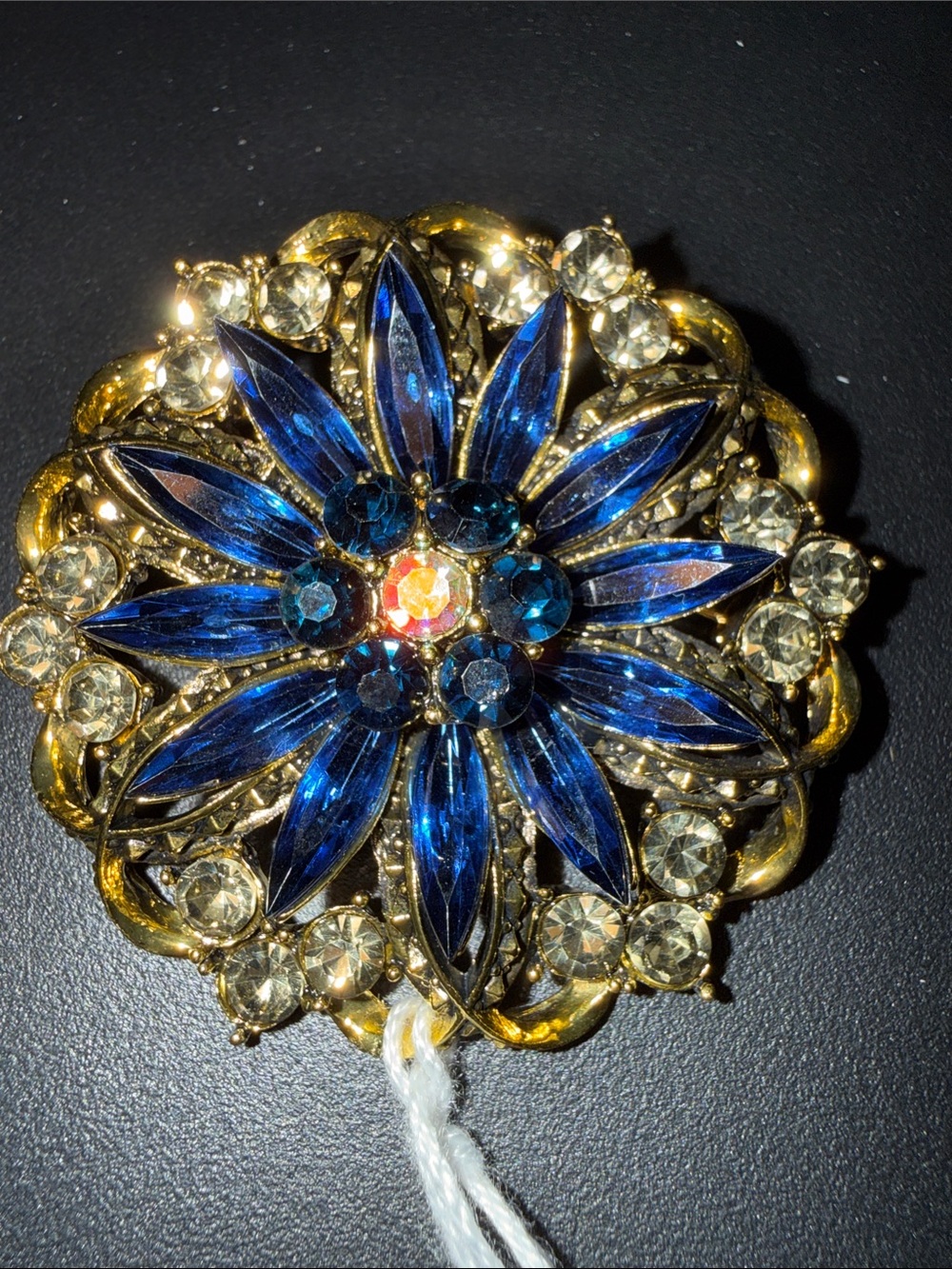 Gold-Tone Blue Crystal Floral Brooch